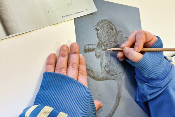 ABM Zeichnen Hände und eine Zeichnung